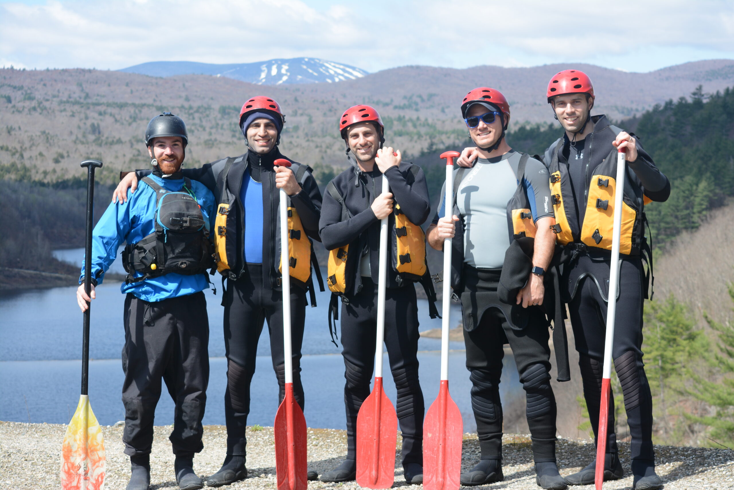 Bachelor Party at top of dam with reservoir in background